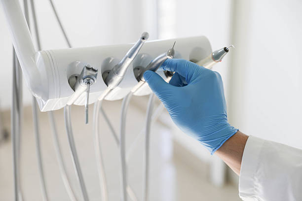 Professional Root Canal Treatment technician working in Tucson Estates, AZ